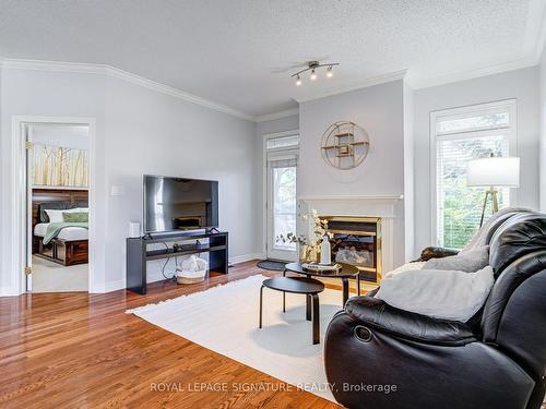 145-2025 Meadowgate Blvd, London, ON - Indoor Photo Showing Living Room With Fireplace