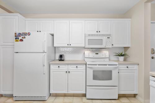 106-1964 Enterprise Way, Kelowna, BC - Indoor Photo Showing Kitchen