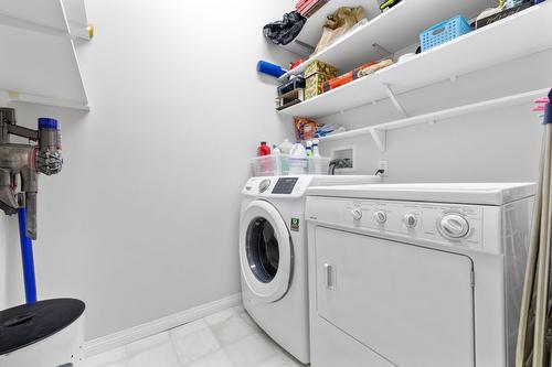 106-1964 Enterprise Way, Kelowna, BC - Indoor Photo Showing Laundry Room