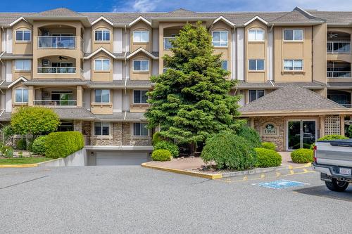 106-1964 Enterprise Way, Kelowna, BC - Outdoor With Balcony With Facade