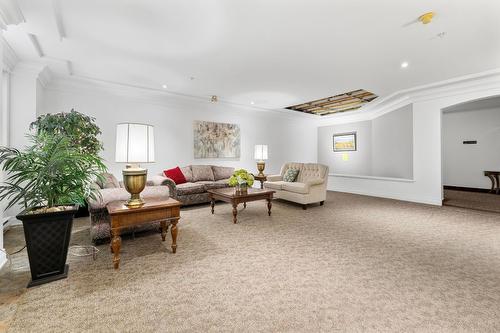 106-1964 Enterprise Way, Kelowna, BC - Indoor Photo Showing Living Room