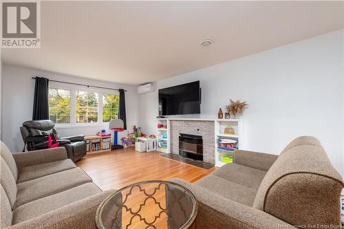 55 Poirier, Moncton, NB - Indoor Photo Showing Living Room With Fireplace