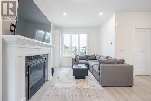 6 Church Street E, Halton Hills, ON - Indoor Photo Showing Living Room With Fireplace