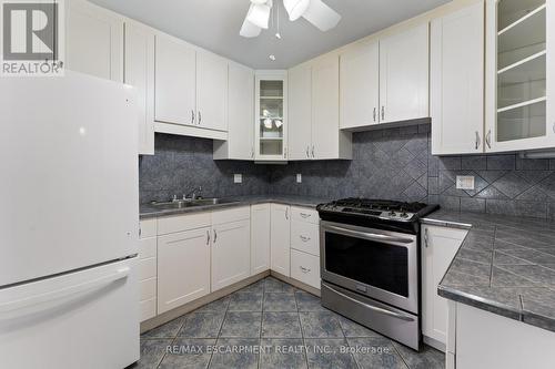 46 Graham Avenue S, Hamilton, ON - Indoor Photo Showing Kitchen With Double Sink