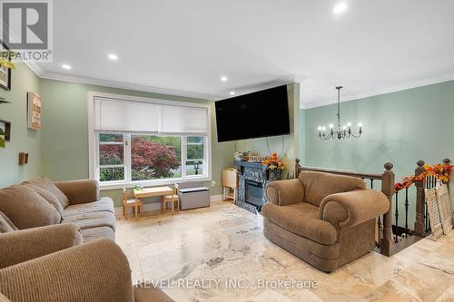 161 Ridge Road S, Fort Erie, ON - Indoor Photo Showing Living Room With Fireplace