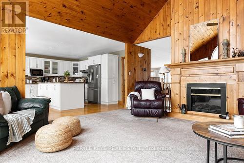 200 Edgemere Road E, Huntsville, ON - Indoor Photo Showing Living Room With Fireplace