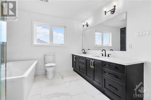 Images provided are to showcase builder finishes. Some photos have been virtually staged. - 437 Fleet Canuck Private, Ottawa, ON - Indoor Photo Showing Bathroom