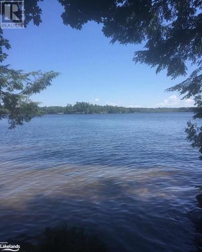 Only 500ft to Lake Muskoka, Access to swim, kayak or paddle board - 1005 Road 3300, Gravenhurst, ON - Outdoor With Body Of Water With View