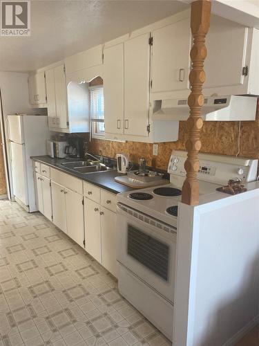 05-01 Little Port Harmon Road, Stephenville, NL - Indoor Photo Showing Kitchen With Double Sink