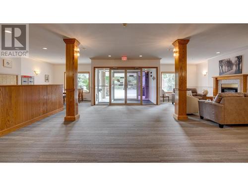 3805 30 Avenue Unit# 409, Vernon, BC - Indoor Photo Showing Living Room With Fireplace