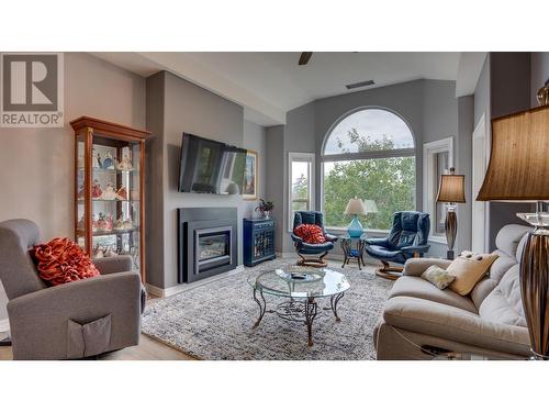 3805 30 Avenue Unit# 409, Vernon, BC - Indoor Photo Showing Living Room With Fireplace