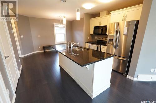 4562 Harbour Landing Drive, Regina, SK - Indoor Photo Showing Kitchen With Double Sink