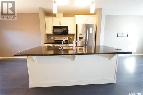 4562 Harbour Landing Drive, Regina, SK - Indoor Photo Showing Kitchen With Upgraded Kitchen