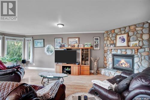 9023 6Th Street, Rosthern, SK - Indoor Photo Showing Living Room With Fireplace