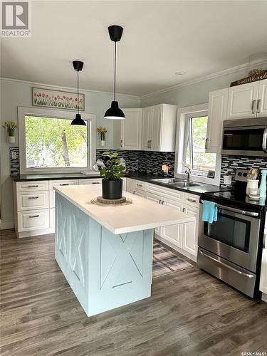 329 7Th Avenue W, Nipawin, SK - Indoor Photo Showing Kitchen With Double Sink With Upgraded Kitchen