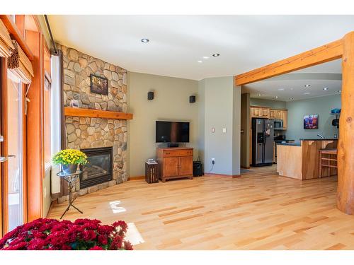 5 - 1008 Olaus Way, Rossland, BC - Indoor Photo Showing Living Room With Fireplace