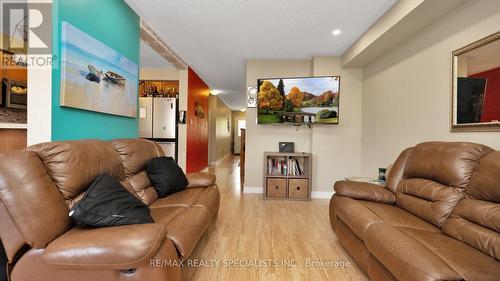 100 - 16 Bellhaven Crescent, Brampton, ON - Indoor Photo Showing Living Room