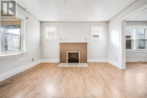 1531 Windsor Avenue Unit# Main, Windsor, ON - Indoor Photo Showing Other Room With Fireplace