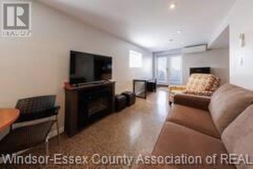 280 Simcoe Unit# Lower, Amherstburg, ON - Indoor Photo Showing Living Room With Fireplace