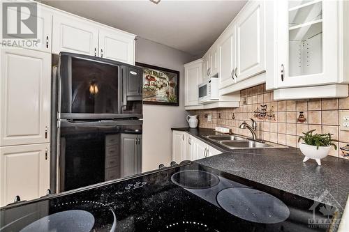 2020 Jasmine Crescent Unit#918, Ottawa, ON - Indoor Photo Showing Kitchen With Double Sink