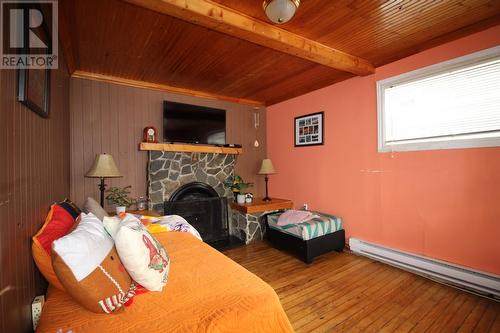 194 Harvey Street, Harbour Grace, NL - Indoor Photo Showing Other Room With Fireplace