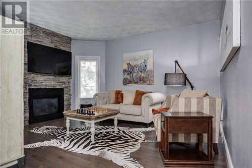 1532 Madison, Sudbury, ON - Indoor Photo Showing Living Room With Fireplace