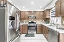 Upper - 17 Roadmaster Lane, Brampton, ON  - Indoor Photo Showing Kitchen With Double Sink 