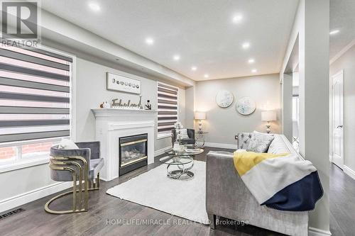 Upper - 17 Roadmaster Lane, Brampton, ON - Indoor Photo Showing Living Room With Fireplace