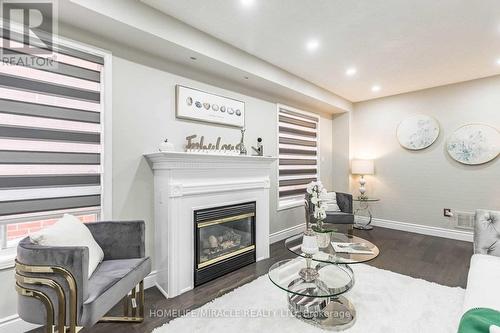 Upper - 17 Roadmaster Lane, Brampton, ON - Indoor Photo Showing Living Room With Fireplace