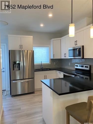 7652 Mapleford Boulevard, Regina, SK - Indoor Photo Showing Kitchen With Stainless Steel Kitchen