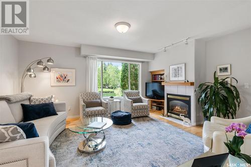 901B 9Th Street E, Saskatoon, SK - Indoor Photo Showing Living Room With Fireplace