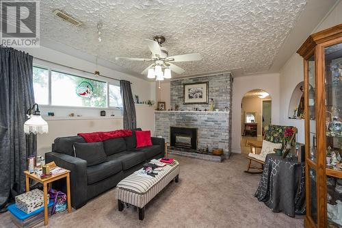 3191 2Nd Avenue, Prince George, BC - Indoor Photo Showing Living Room With Fireplace