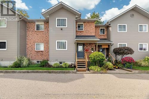 6 - 18 Sauble River Road, Lambton Shores (Grand Bend), ON - Outdoor With Facade