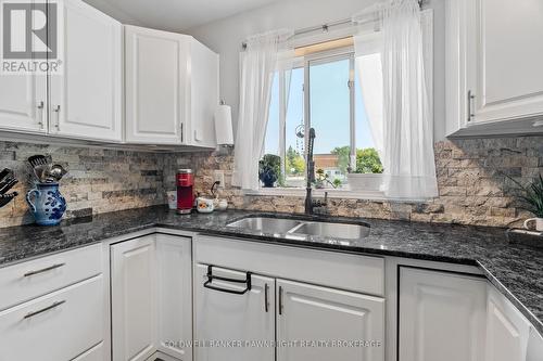 6 - 18 Sauble River Road, Lambton Shores (Grand Bend), ON - Indoor Photo Showing Kitchen With Double Sink