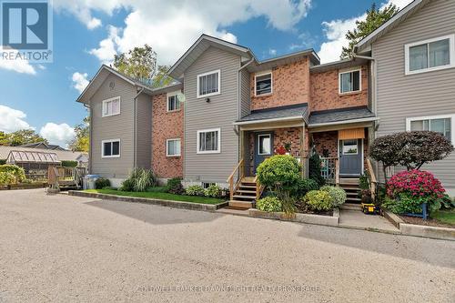 6 - 18 Sauble River Road, Lambton Shores (Grand Bend), ON - Outdoor With Facade