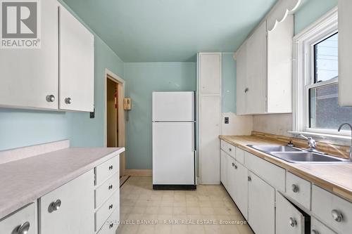 34 Simpson Avenue, Clarington (Bowmanville), ON - Indoor Photo Showing Kitchen With Double Sink