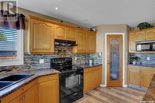 4 Kalmia Crescent, Moose Jaw, SK - Indoor Photo Showing Kitchen With Double Sink