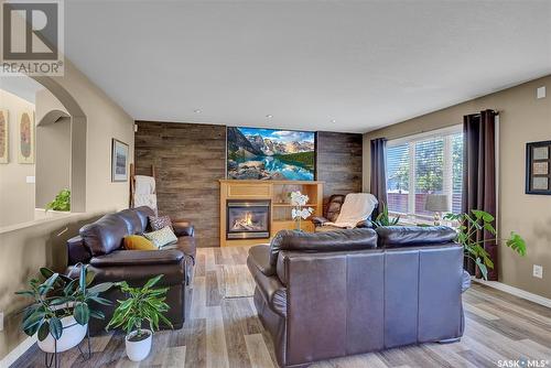 4 Kalmia Crescent, Moose Jaw, SK - Indoor Photo Showing Living Room With Fireplace