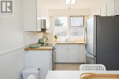 1611 Elm Street E, Kelowna, BC - Indoor Photo Showing Kitchen With Double Sink