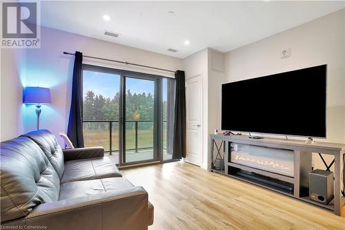 525 New Dundee Road Unit# 203, Kitchener, ON - Indoor Photo Showing Living Room With Fireplace