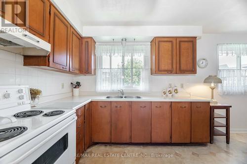 2049 Family Crescent, Mississauga, ON - Indoor Photo Showing Kitchen With Double Sink