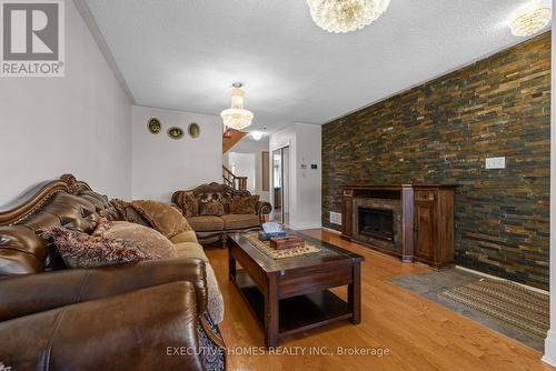 5415 Longford Drive, Mississauga, ON - Indoor Photo Showing Living Room With Fireplace