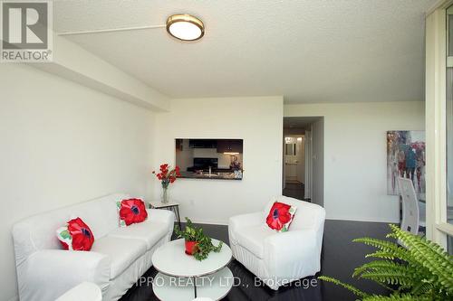 403 - 1 Hickory Tree Road, Toronto, ON - Indoor Photo Showing Living Room