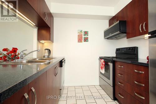 403 - 1 Hickory Tree Road, Toronto, ON - Indoor Photo Showing Kitchen With Double Sink