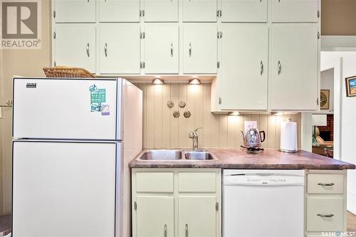 301 109Th Street W, Saskatoon, SK - Indoor Photo Showing Kitchen With Double Sink