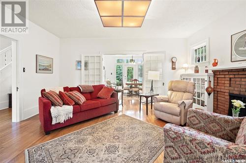 301 109Th Street W, Saskatoon, SK - Indoor Photo Showing Living Room With Fireplace