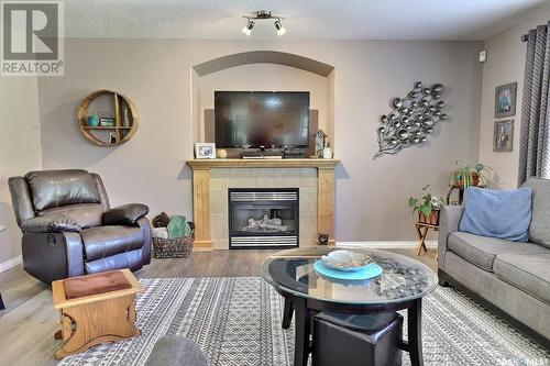 1142 Degelman Drive, Regina, SK - Indoor Photo Showing Living Room With Fireplace