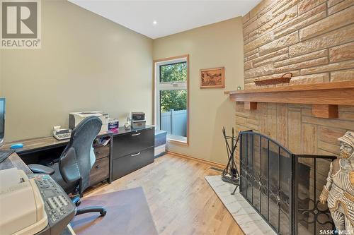 824 5Th Avenue N, Saskatoon, SK - Indoor Photo Showing Office With Fireplace