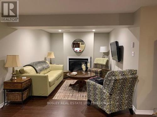 80 Hughes Street S, Collingwood, ON - Indoor Photo Showing Living Room With Fireplace