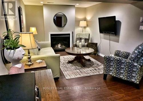 80 Hughes Street S, Collingwood, ON - Indoor Photo Showing Living Room With Fireplace